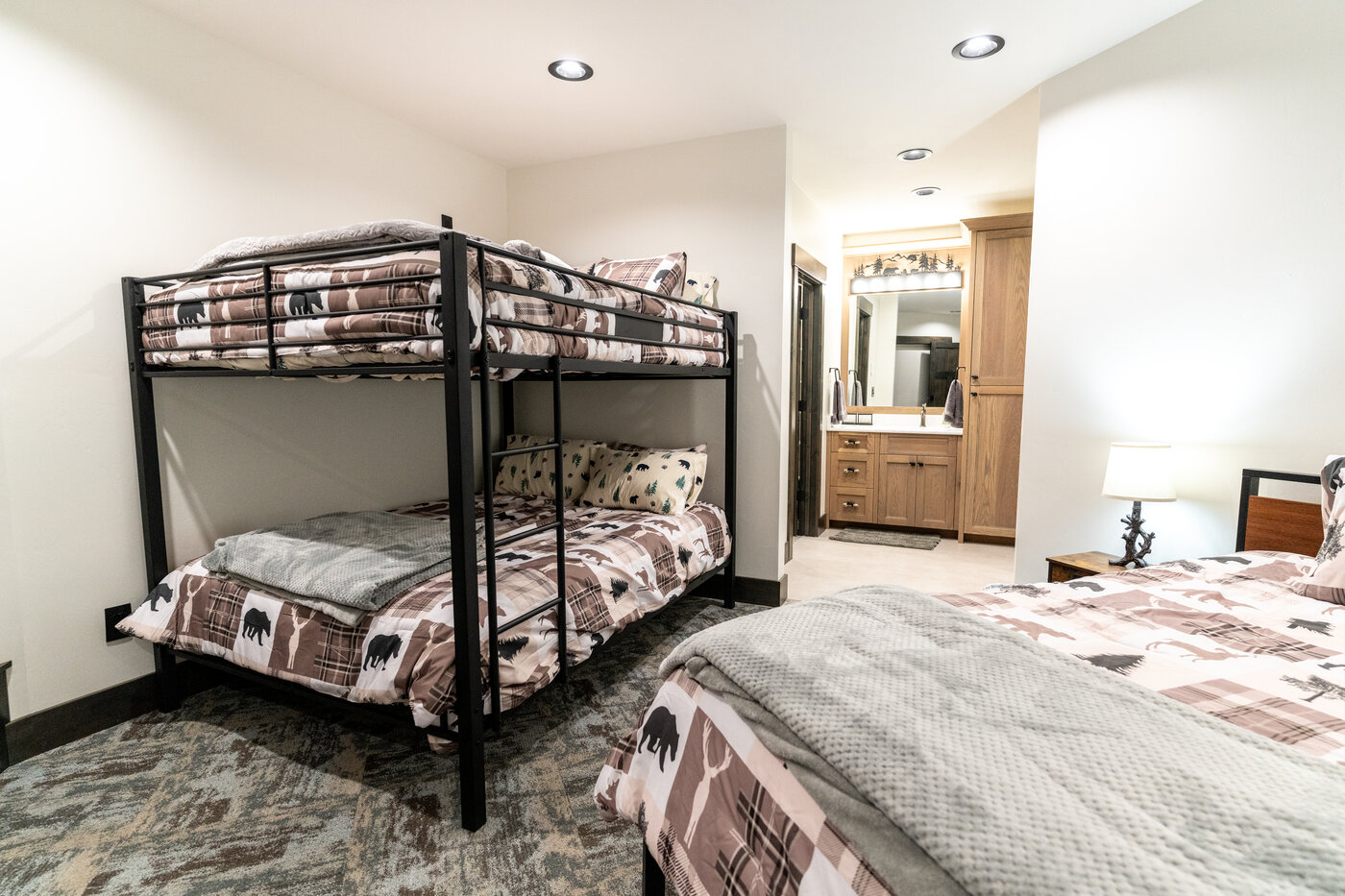 Beautiful Views — large kids bedroom with two queen beds and a queen-over-queen bunk set