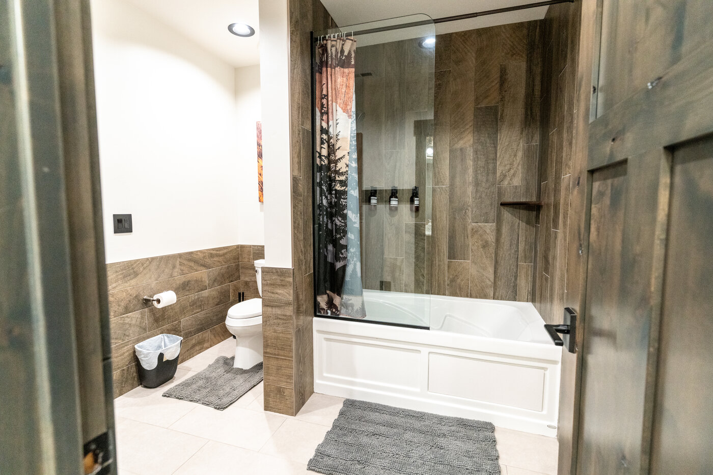 Beautiful Views — bathroom with side-by-side soaking tub and glass-enclosed shower