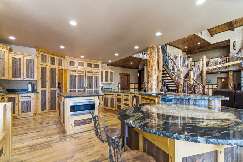 Luxury great room with fireplace at Riverfront Wildlife Lodge near Yellowstone