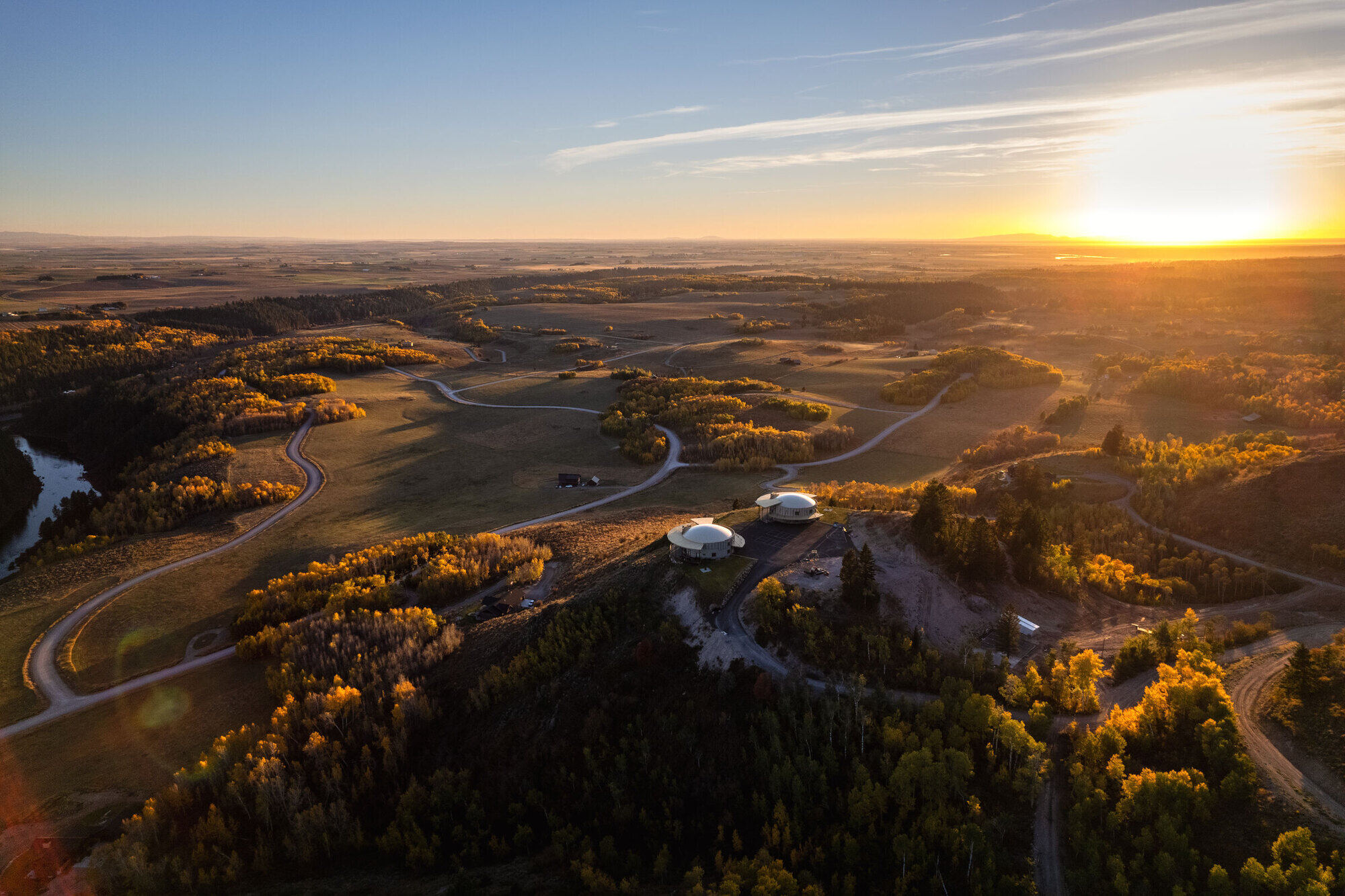 Teton View Retreat — twin domes at golden hour, Ashton Idaho