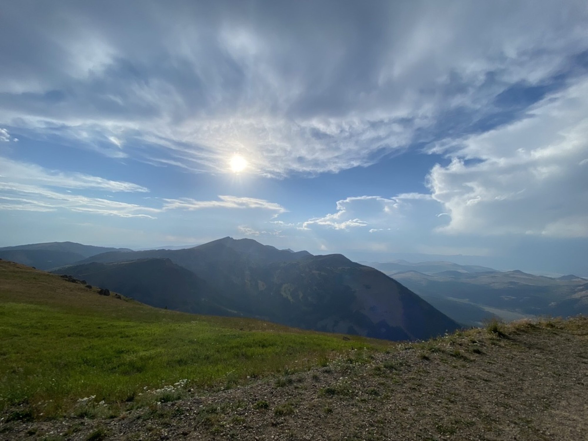 Golden-hour mountain sunrays — fall colors in the <a href=