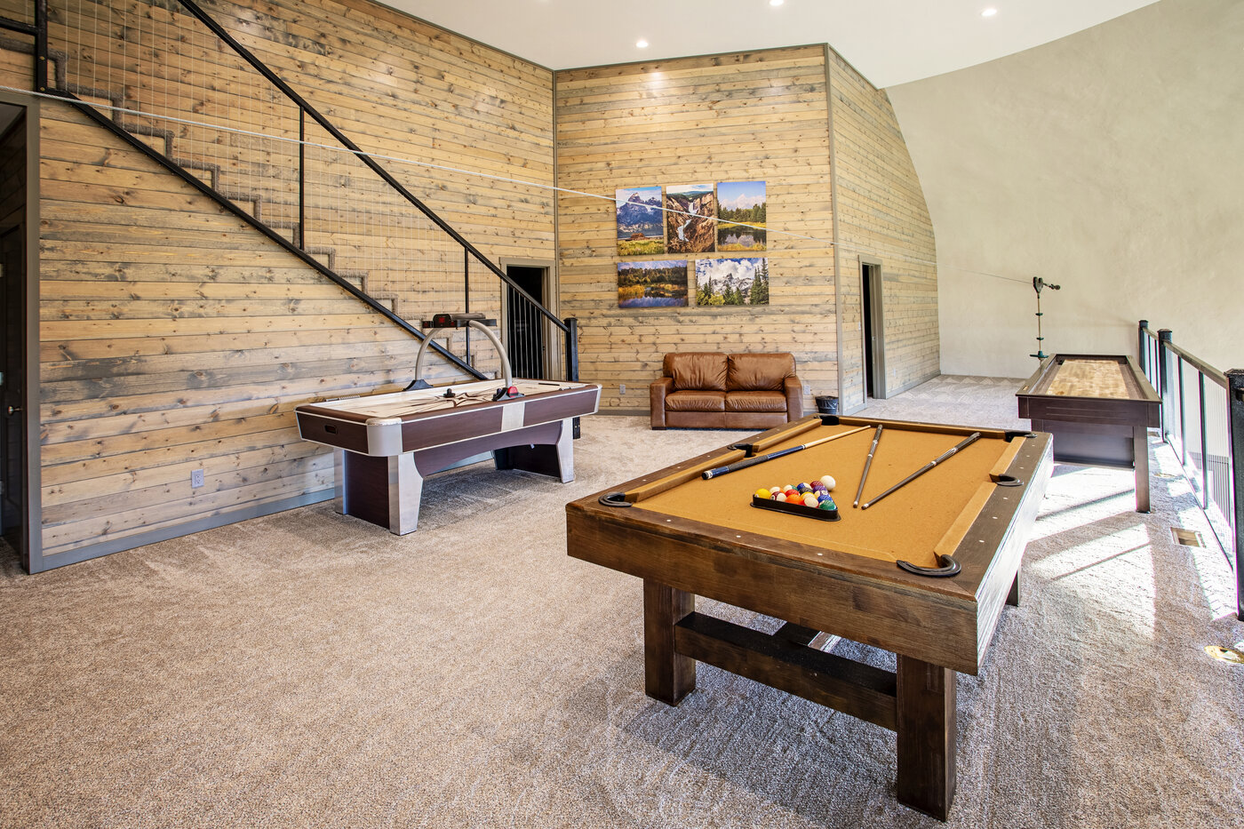 Teton View Retreat — Both Domes — upper game room with pool, air hockey, and shuffleboard