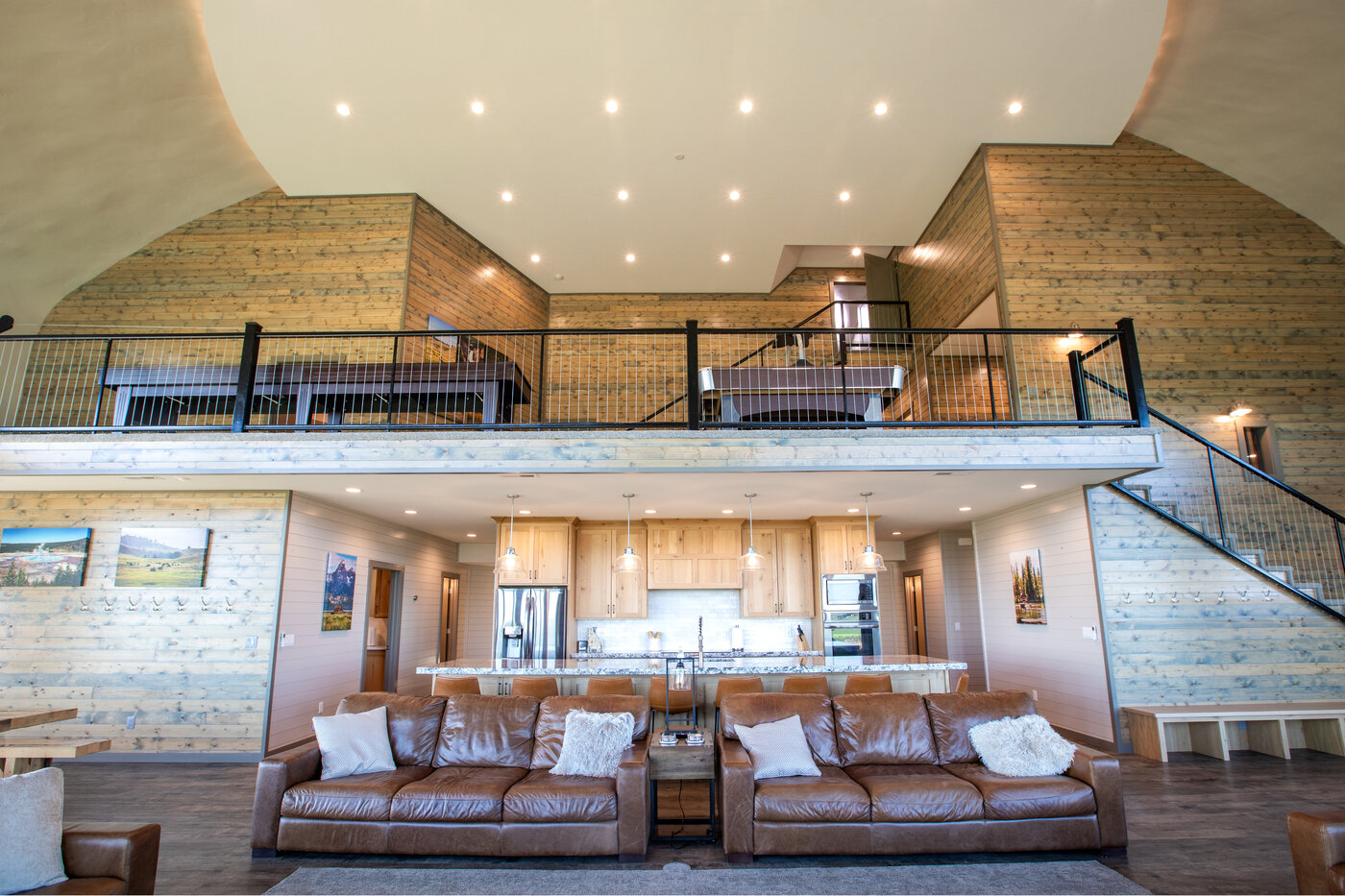 Teton View Retreat — Both Domes — great room interior looking up at the curved dome ceiling and second-floor balcony