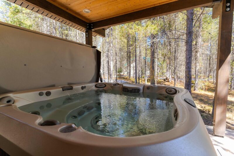 Private hot tub at Trails End Lodge on Bills Island in Island Park