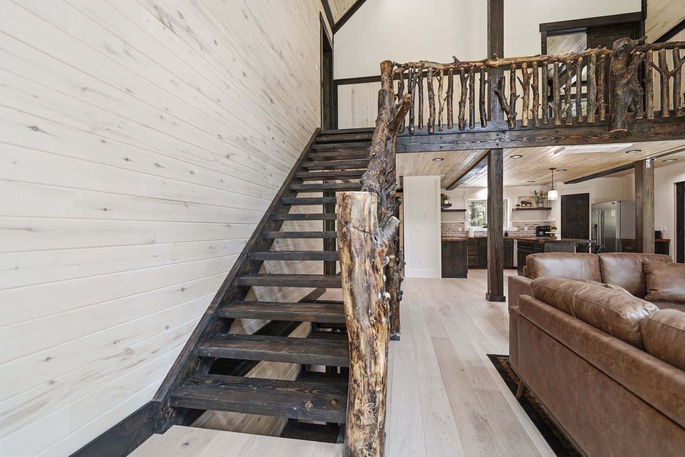The Treehouse — great room and loft with open staircase