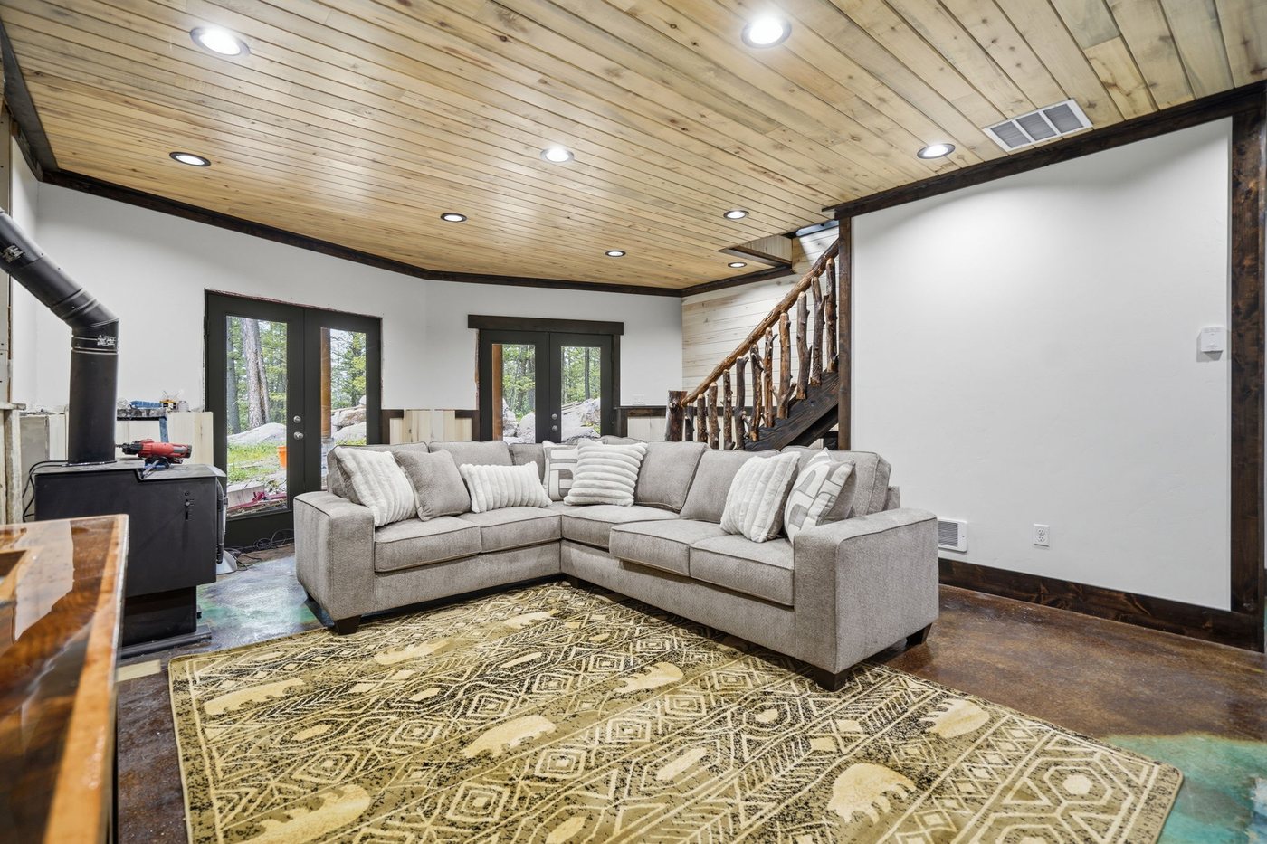 The Treehouse — lower level family room with sectional seating