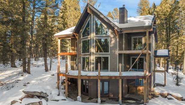 The Treehouse — forest cabin exterior near Yellowstone, sleeps 14